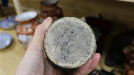 A Chinese green glazed pottery twin handled vase, in Tang style, 20.5cm.